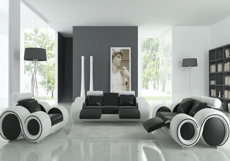 Fancy Homes Ruota lounges suites leather sofa in black and white leather featuring folding middle table and footrests
