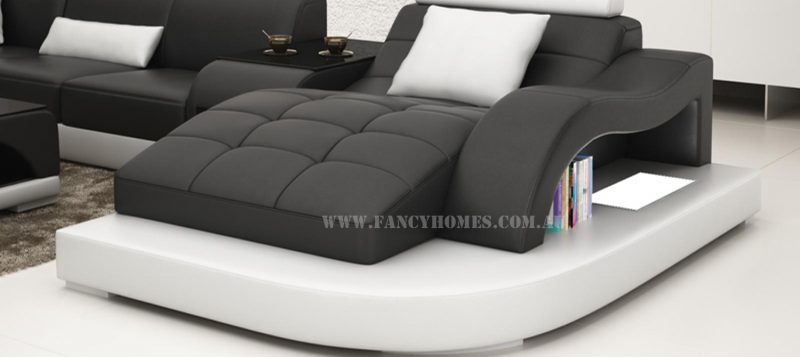 Fancy Homes Aura modular leather sofa features curved chaise with LED lighting system
