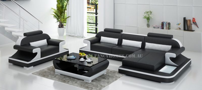 Fancy Homes Bruno-E chaise leather sofa in black and white leather comes with a single armchair. It features curved armrests, adjustable headrests and LED lighting systems.