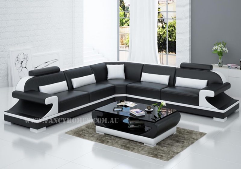 Fancy Homes Bruno-B corner leather sofa in black and white leather featuring curved armrests and adjustable headrests