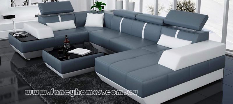 Fancy Homes Elite modular leather sofa in blue and white leather featuring adjustable headrests and built-in side table