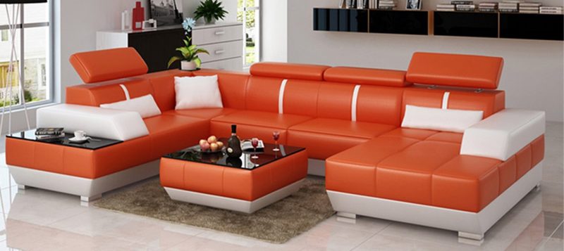 Fancy Homes Elite modular leather sofa in orange and white leather with built-in side table and easy-adjust headrests