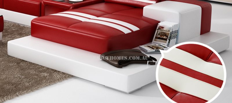 The extra-wide chaise of Fancy Homes Evelyn modular leather sofa