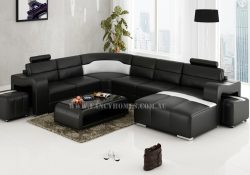 Fancy Homes Erika modular leather sofa in black and white leather featuring unique armrests and removable ottomans