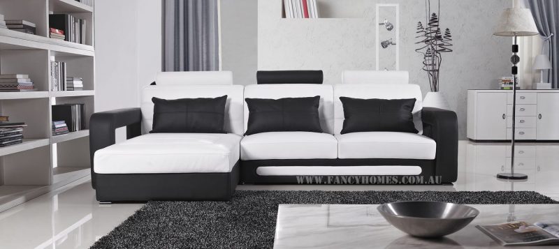 Fancy Homes Java-B chaise leather sofa in white and black leather featuring adjustable headrests