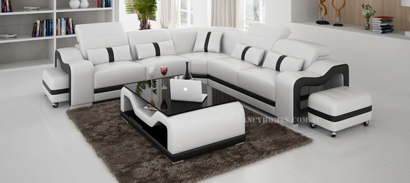 Fancy Homes Kori-B corner leather sofa in white and black leather featuring movable ottoman and adjustable headrests