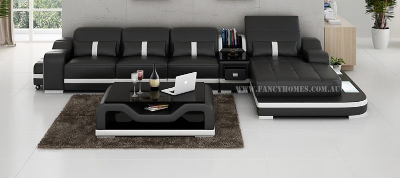 Fancy Homes Kori-C chaise leather sofa in black and white leather with middle table, movable ottoman and LED lighting system