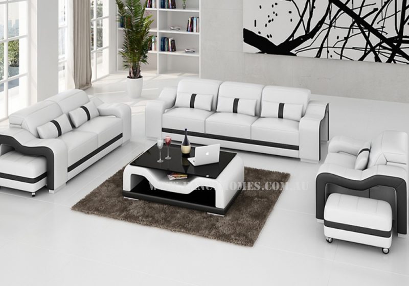 Fancy Homes Kori-D lounge suites leather sofa in white and black leather with movable ottomans and adjustable headrests