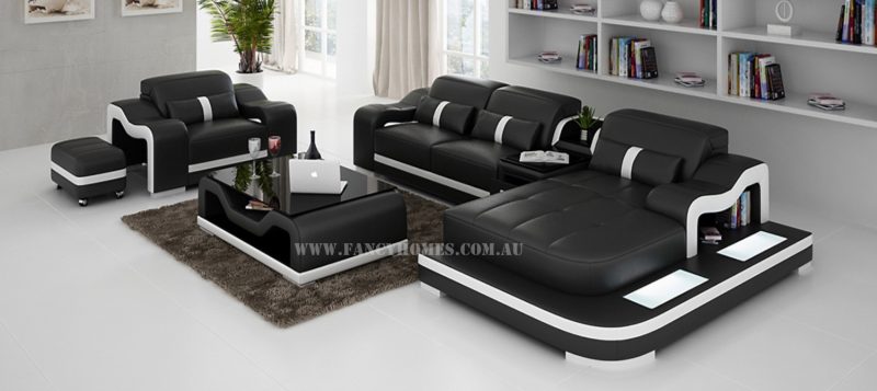 Fancy Homes Kori-E chaise leather sofa in black and white leather with a single seater, movable ottoman, LED lighting system and adjustable headrests