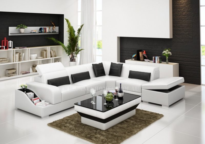 Fancy Homes Paloma-D corner leather sofa in white and black leather featured with easy-adjust headrests, bookshelves and storage ottoman