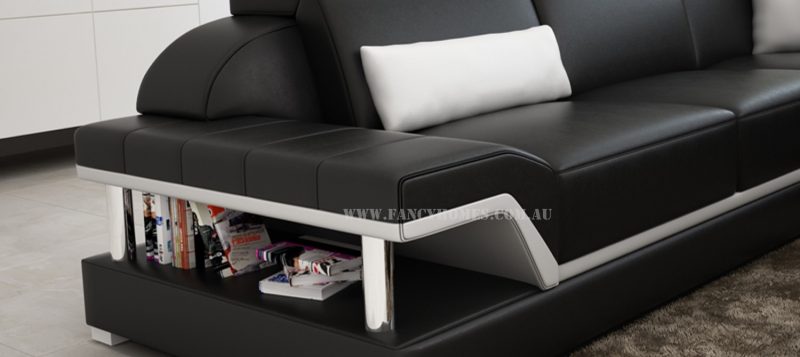 The armrests of Paxton modular leather sofa comes with storage space