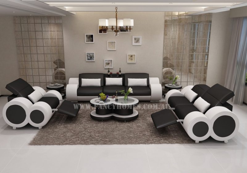 Fancy Homes Renata-E lounges suites leather sofa in black and white leather with built-in middle table and foldable footrests
