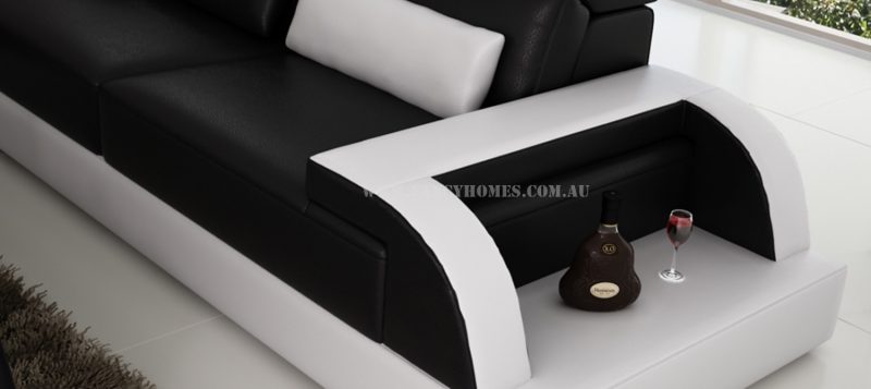 The curved design armrests of Siena-B corner leather sofa featuring open-shelf displays and storage functions