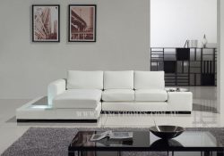 Fancy Homes Sonia-B chaise leather sofa in white leather featuring built-in side table and lightings