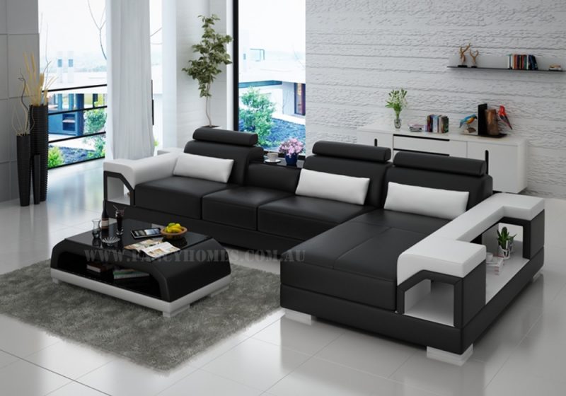 Fancy Homes Vera-C chaise leather sofa in black and white leather featuring storage armrests, adjustable headrests and in-built cupholder