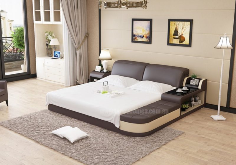 Fancy Homes Christi Leather Bed Frame Leather Bed in brown and beige featuring storage ottomans and bedhead, in-built side table