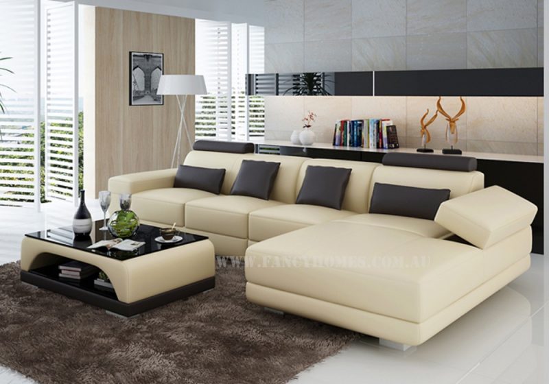 Casanova-C chaise leather sofa in beige and brown leather featuring storage armrest and adjustable headrests