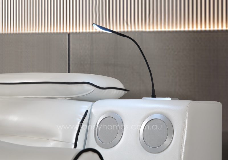 The details of the lamp and Bluetooth speaker on Fancy Homes Karina multifunctional Italian leather bed frame