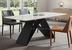 Fancy Homes Vince sintered stone dining table with sculptural black metal base. Customisable in size, shape and stone colours