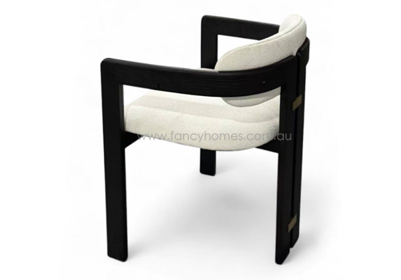 Fancy Homes Evangeline Designer Customisable Dining Chairs Black Wood Legs with Gold Metal Decorations. Product Picture from Side Featuring White Boucle Fabric