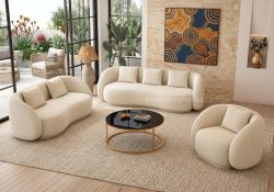 Armonia modern curved fabric lounge suite in cream boucle upholstery, featured in a bright living room
