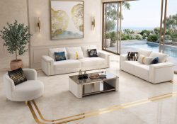 Homera modern fabric lounge suite in black upholstery featuring striking gold metal trim on the armrests.