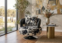 Orbit patterned swivel chair black white cow print