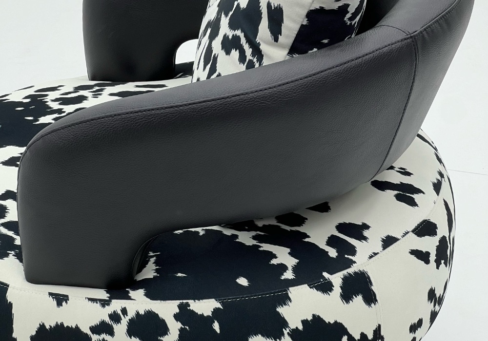 Orbit patterned swivel chair white black Orbit patterned swivel chair black white cow print