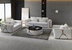 Aurelia modern fabric lounge suite with gold metal trim and white boucle upholstery.